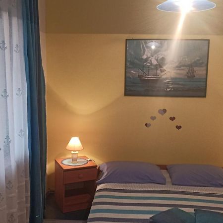 Apartmani Zute Рачишче Номер фото